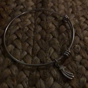 Silver shooting star bracelet.